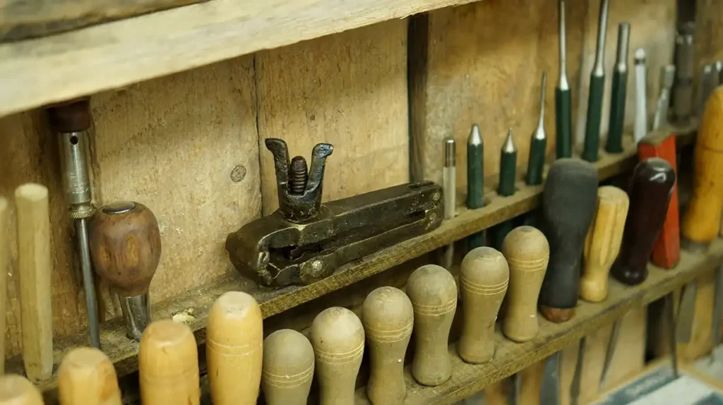 Hand tools and hand/foot powered machines used in 19th century workshop